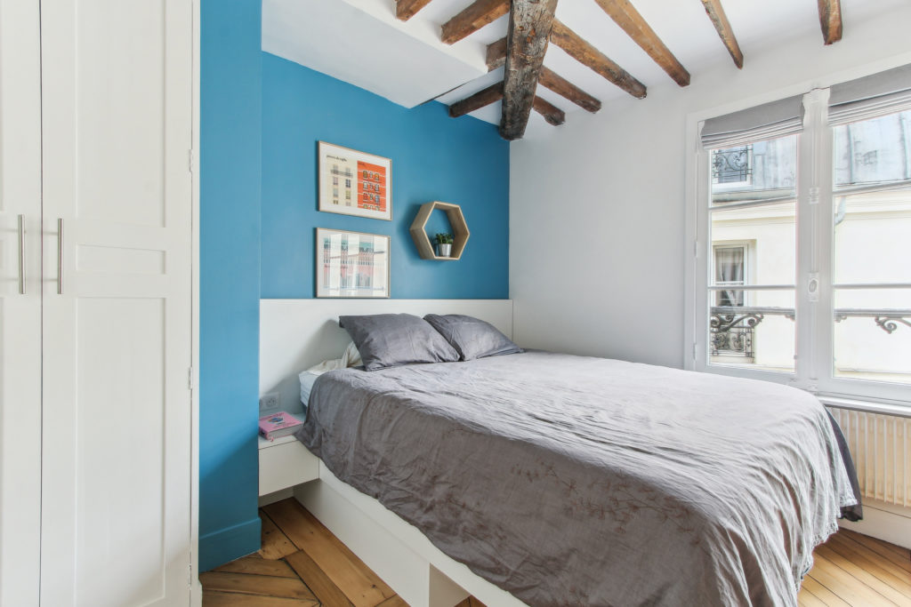 Bedroom 1, the quiet room with the blue wall