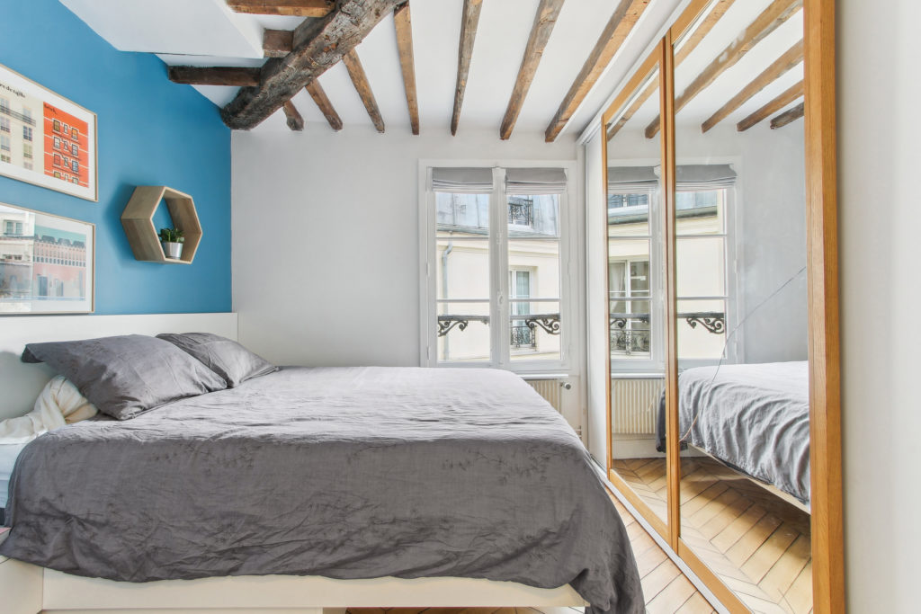 Bedroom 1, the quiet room with the blue wall